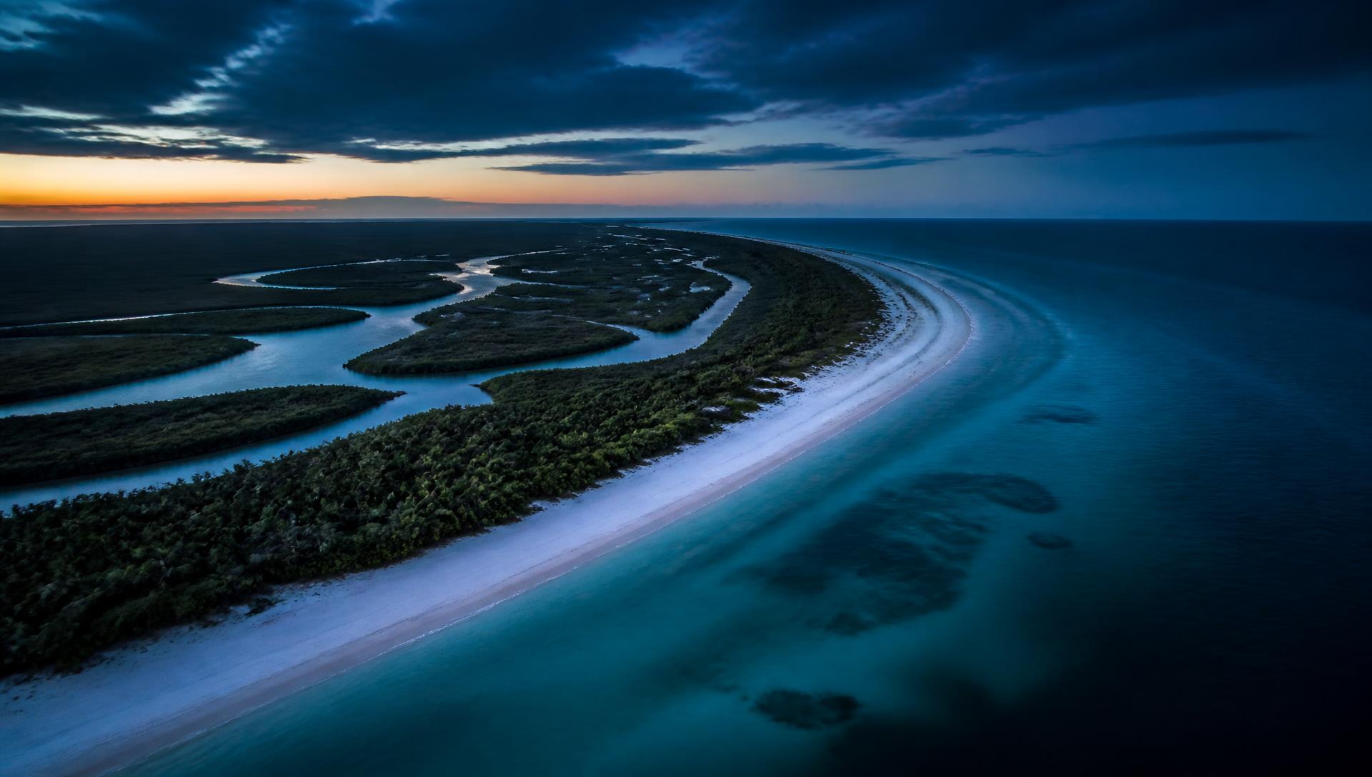 Aerial view of the Marco Island coastline and mangrove channels at dusk